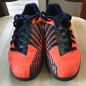 Nike soccer cleats and shin guards.